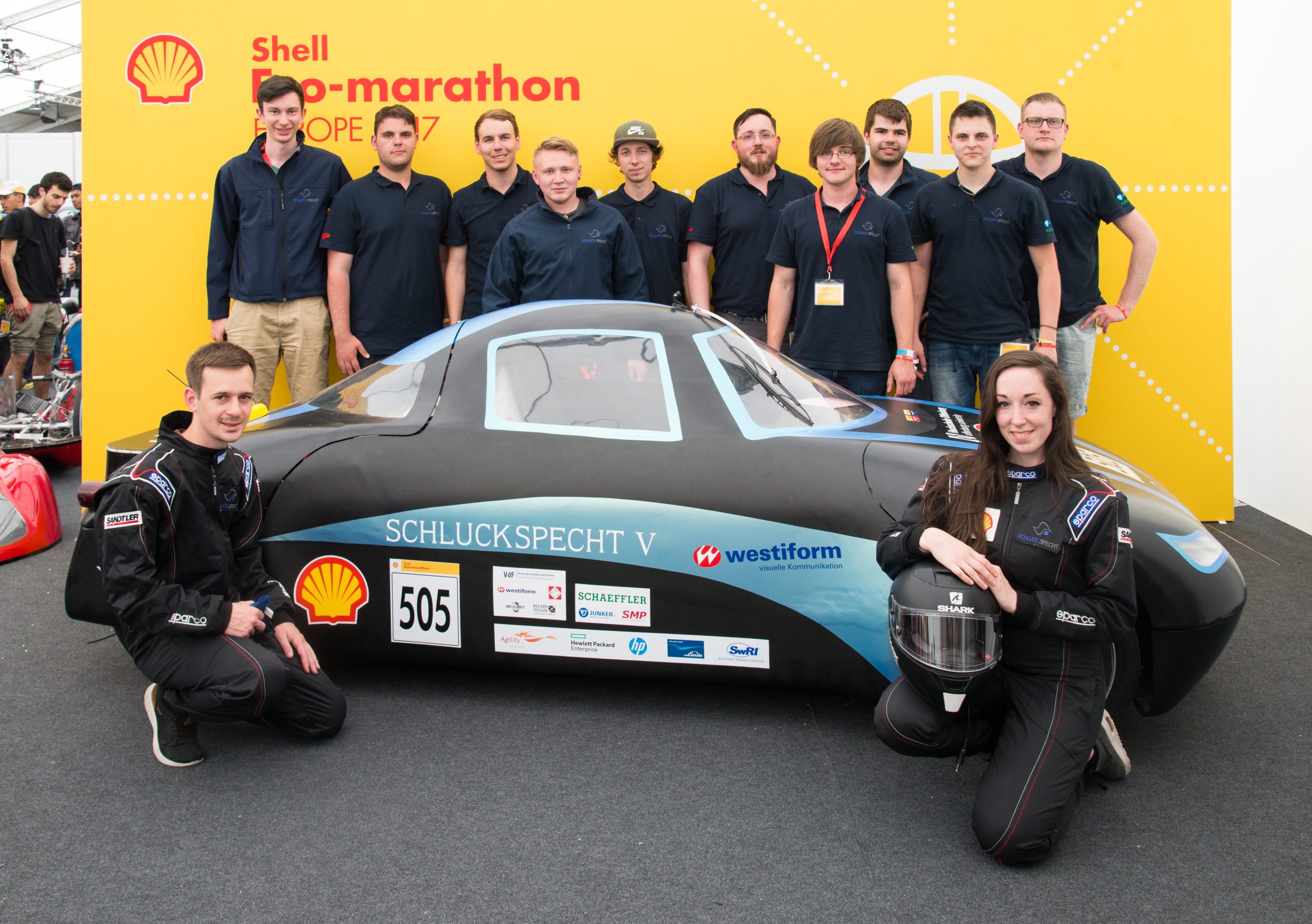 The Schluckspecht 5D, race #505, a diesel UrbanConcept vehicle competing for team Schluckspecht_ from Germany line up for a team portrait at Make the Future Live 2017 in London. (Shell)