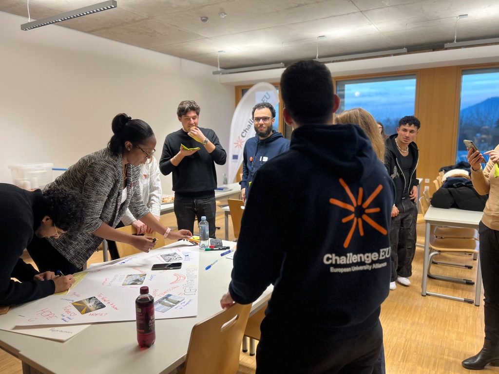 A group of students working together on the workshops during the first official meetup of SAT.