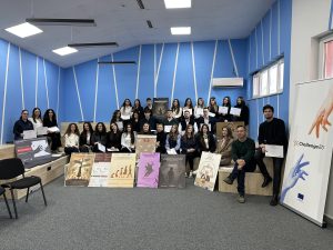 Students, mentors and staff from SEEU pose together holding certificates and showcasing their posters created within the “Family Law through ODEI M.A.R.K.E.T.: Student Perspectives” event, under the ChallengeEU banner.