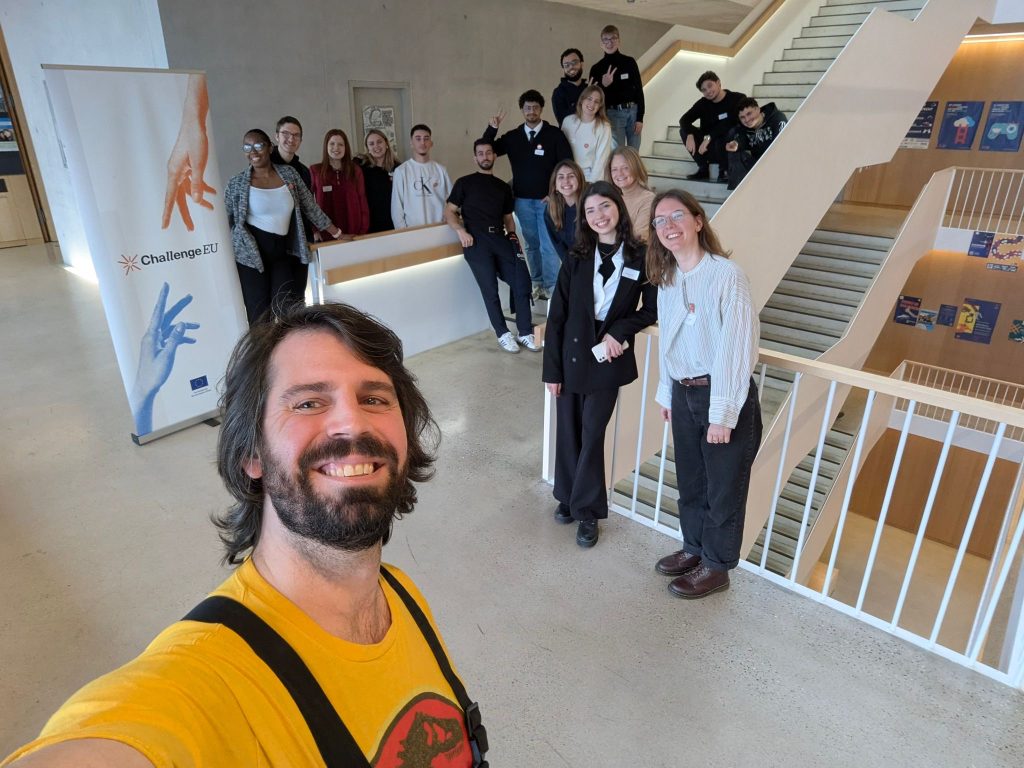 The man makes selfie with Student Ambassadors Team at the University of Offenburg.