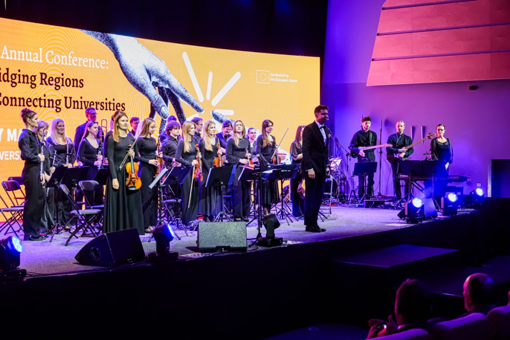 Musicians perform on stage during the artistic part of the ChallengeEU 1st Annual Conference.