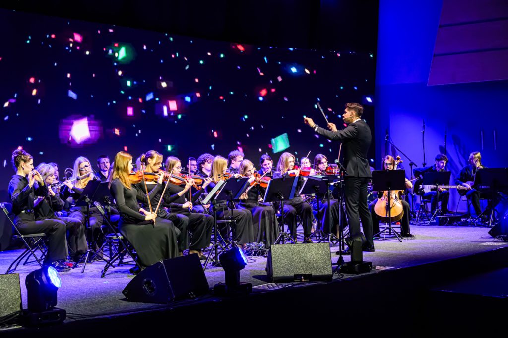 Musicians perform on stage during the artistic part of the ChallengeEU 1st Annual Conference.