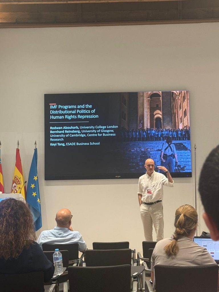 Researcher presenting a study on IMF programmes and the distributional politics of human rights repression.
