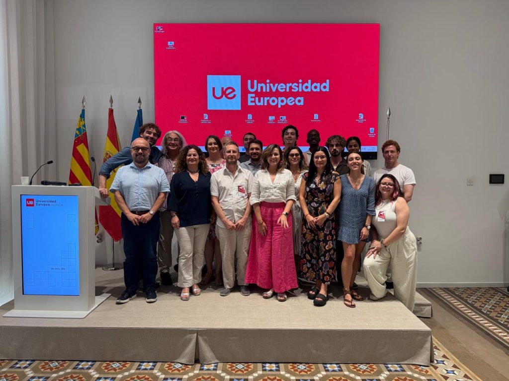 Group photo of Behavioral Bridge participants in a lecture hall at Universidad Europea de Valencia.